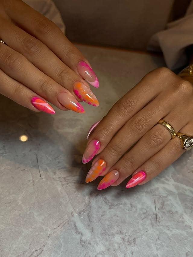 14. Electric Sunset Abstract Nails - pink and orange nail ideas