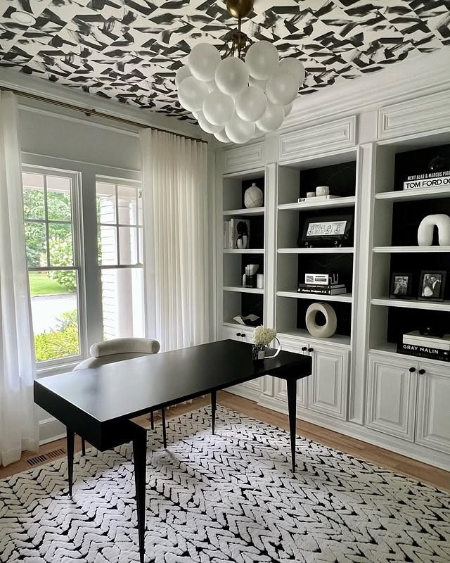 7. Monochrome Contrast with Artistic Flair - feminine home office ideas