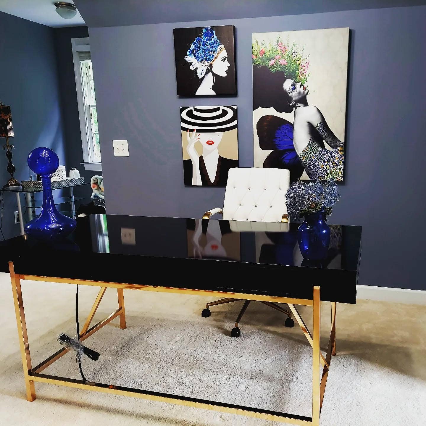 8. Bold Blue Glamour with Art Focus - feminine home office ideas