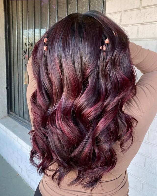 4. Crimson Plum Glamour Curls - Wine Hair Color