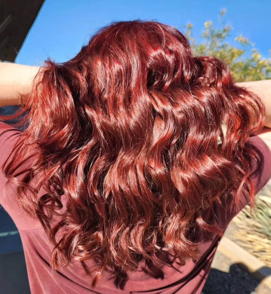 19. Radiant Ruby Curls - Wine Hair Color