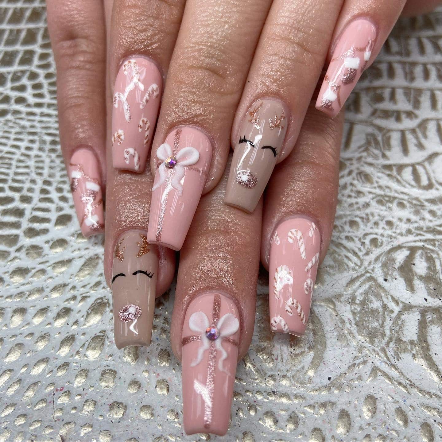 3. Candy Cane and Reindeer Holiday Nails - pink christmas nail ideas