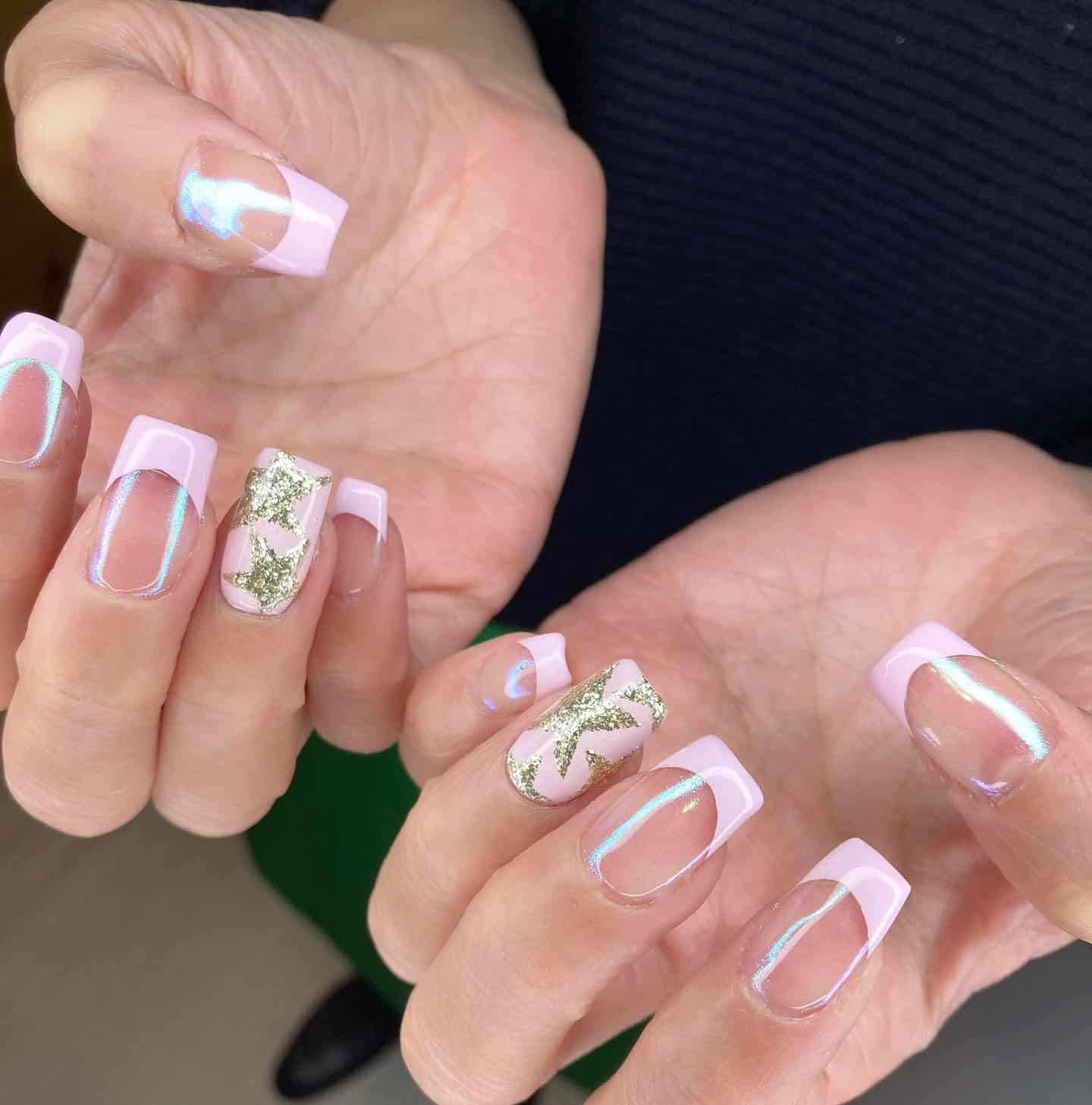 9. Iridescent Pink and Gold Gift Nails - pink christmas nail ideas