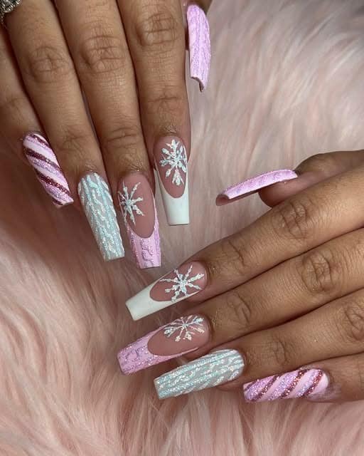 12. Sugarplum Sweater and Snowflake Nails - pink christmas nail ideas