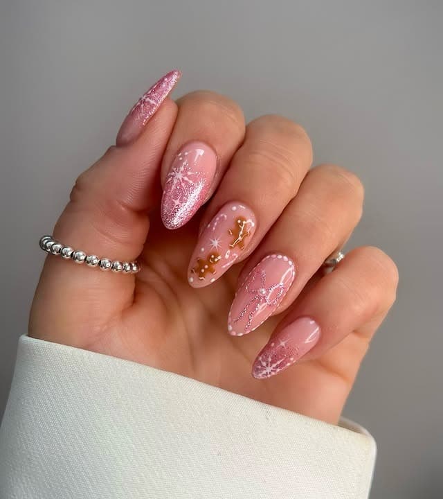15. Glistening Pink Reindeer Nails - pink christmas nail ideas