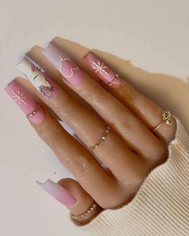 17. Pink Reindeer Winter Nails - pink christmas nail ideas