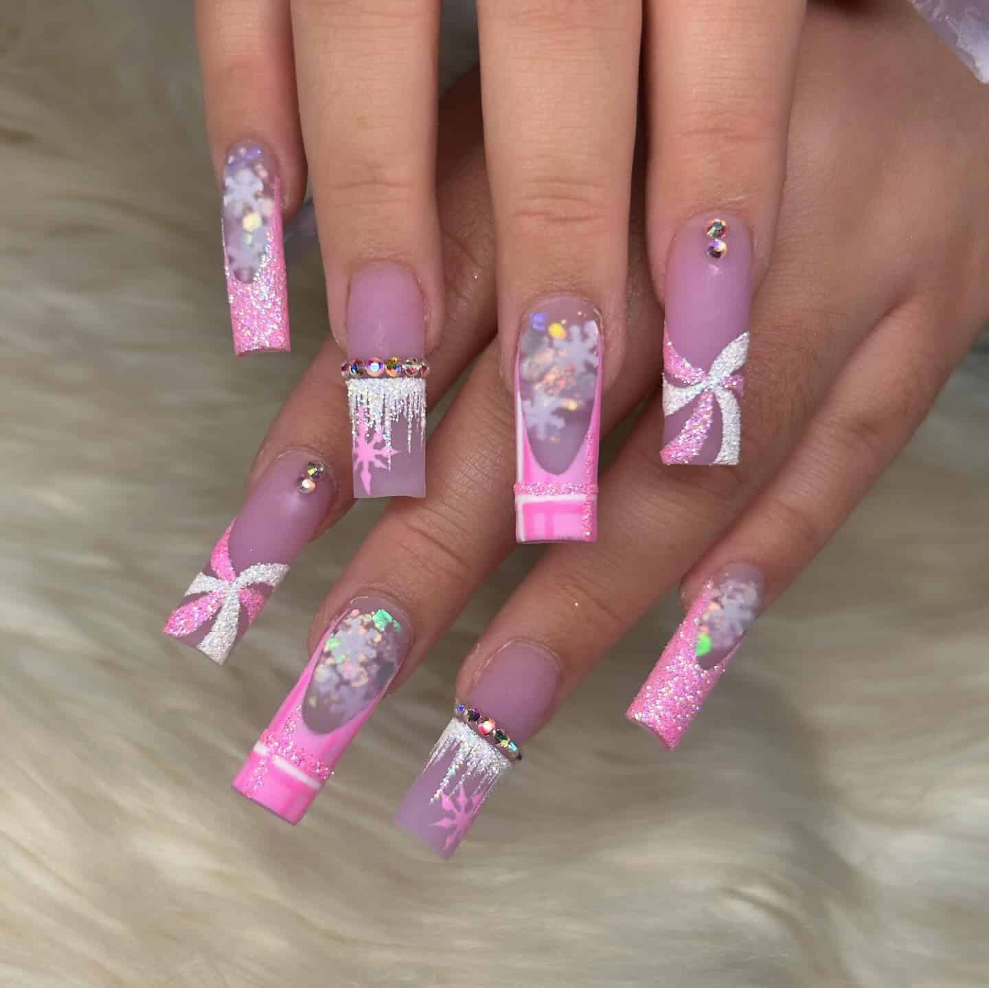 19. Frosty Pink Glitter Gift Nails - pink christmas nail ideas