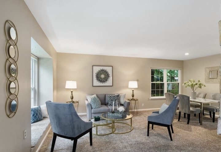 4. Transitional Grace with Soft Neutrals and Blue Accents - gray and blue living room ideas