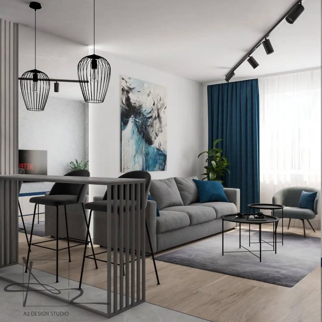 7. Contemporary Loft with Deep Blue Accents - gray and blue living room ideas