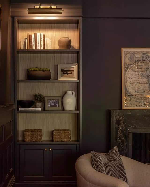 15. Warm Noir Library Nook - dark home office ideas