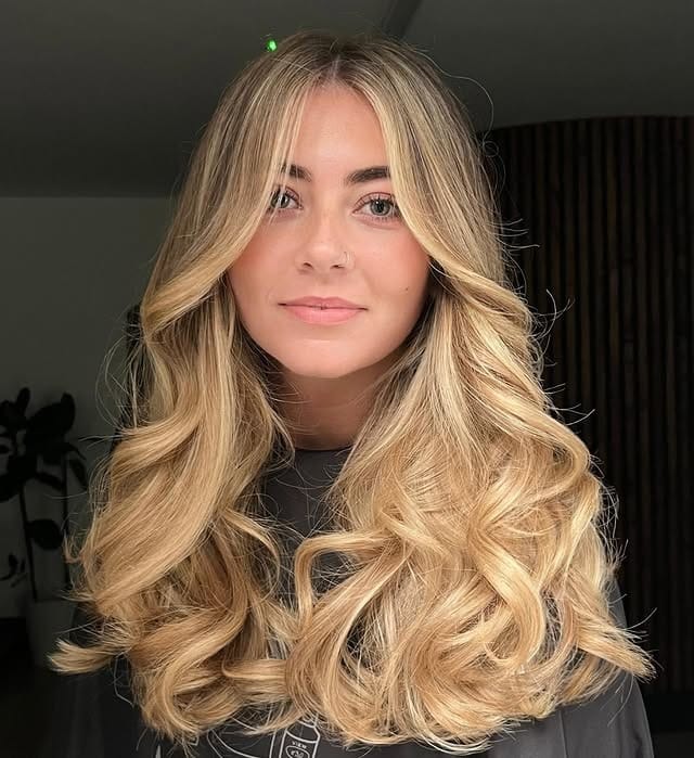 1. Golden Luxe Blowout with Curtain Layers - Summer Hair Color