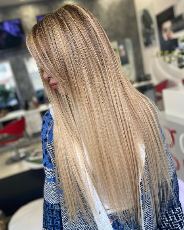 9. Champagne Blonde Sleek Layers - Summer Hair Color