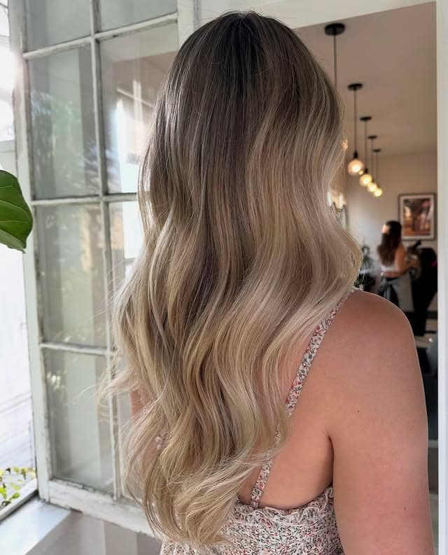 22. Champagne Blonde Melt with Soft Waves - Summer Hair Color