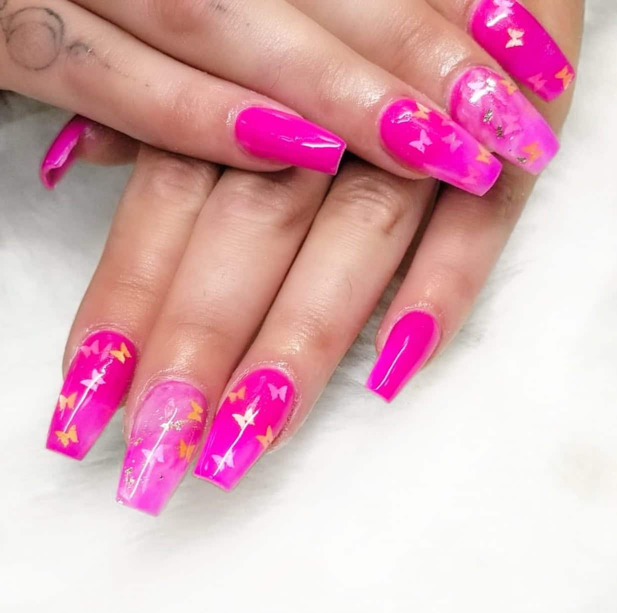 6. Butterfly Blush Coffin Nails - pink coffin nail ideas