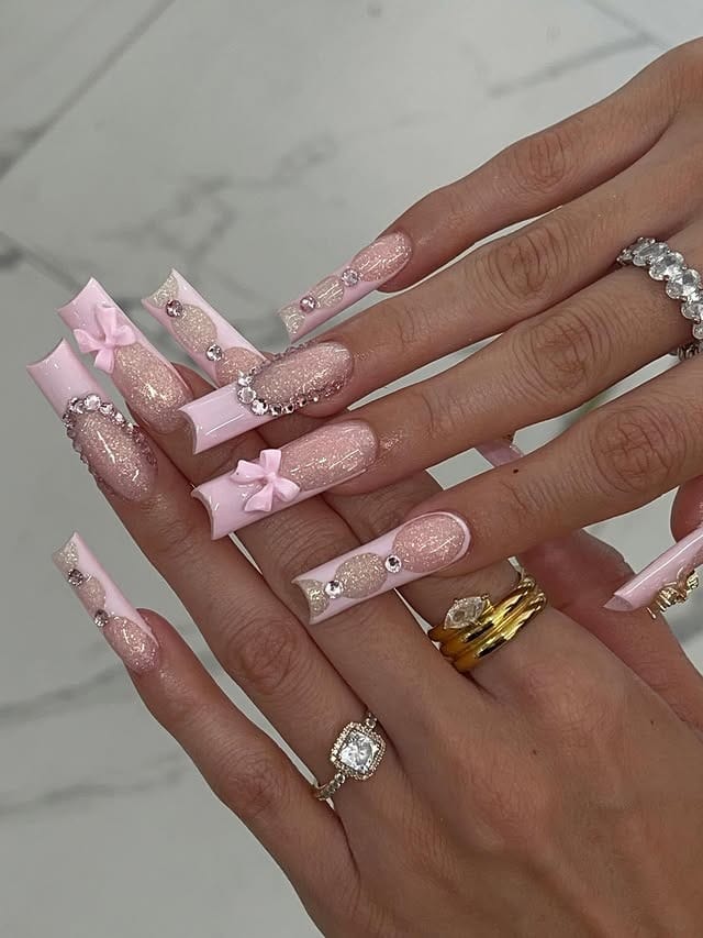 8. Glam Pink Bow Coffin Nails - pink coffin nail ideas