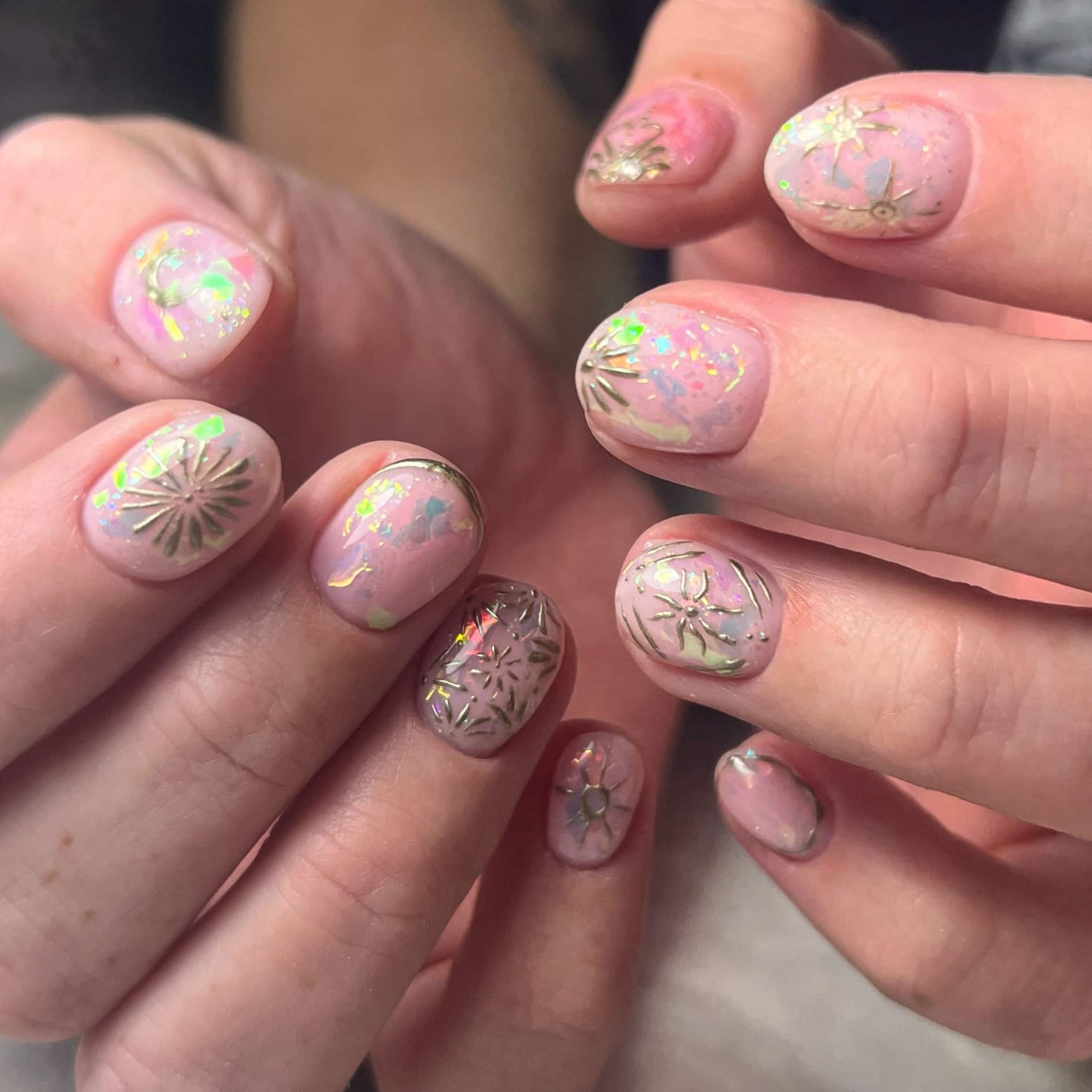 15. Iridescent Floral Chrome Art - pink chrome nail ideas