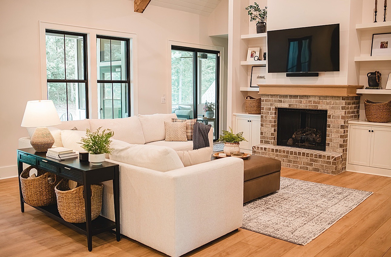 5. Brick and Warm Neutrals Retreat - modern farmhouse living room ideas
