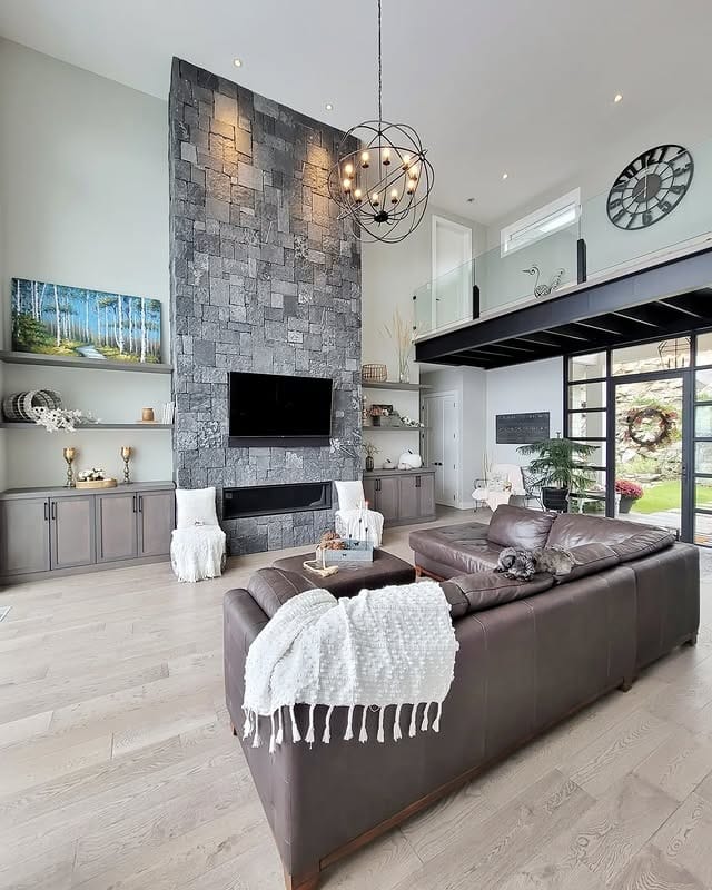 6. Modern Rustic Statement with Stone Texture - modern farmhouse living room ideas