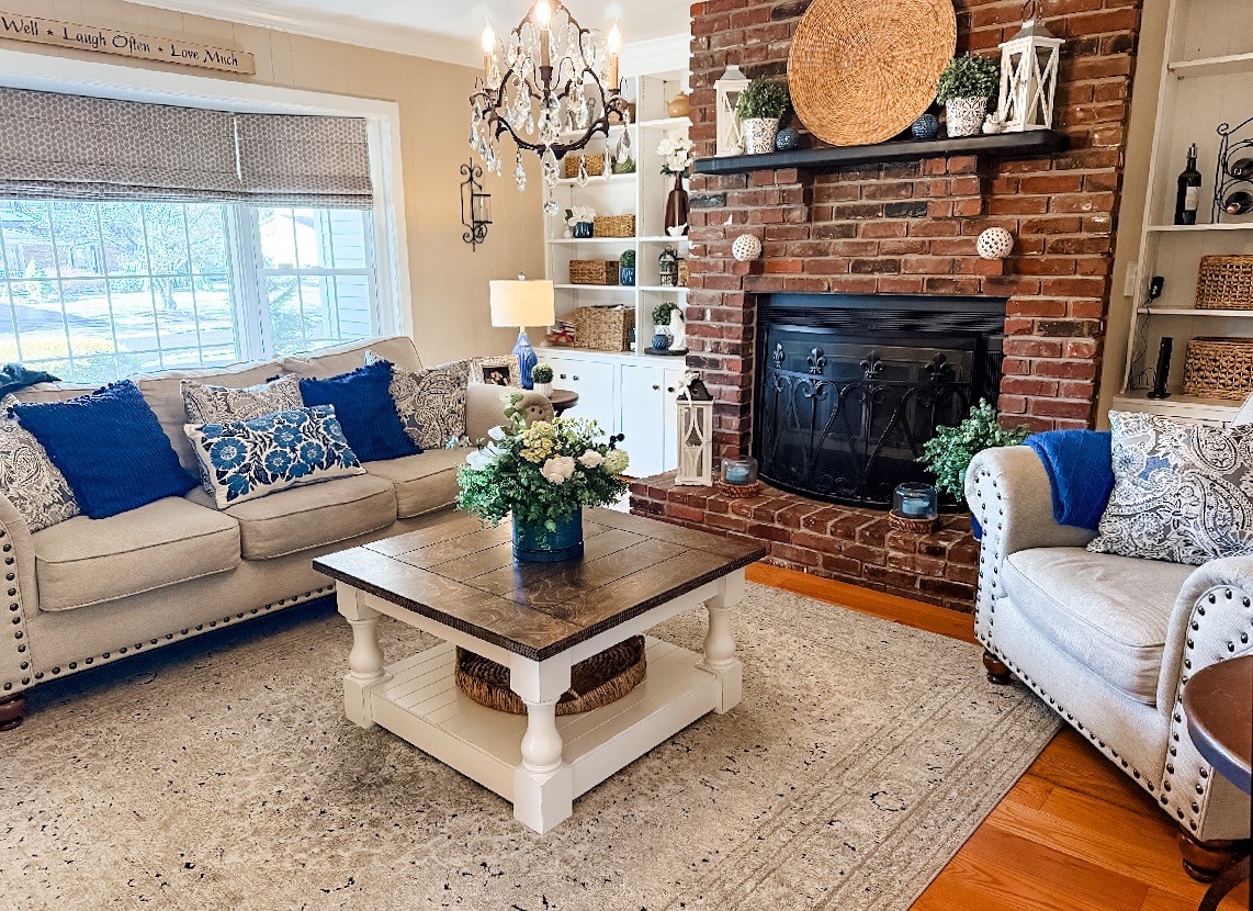 16. Coastal Farmhouse with Blue Accents - modern farmhouse living room ideas