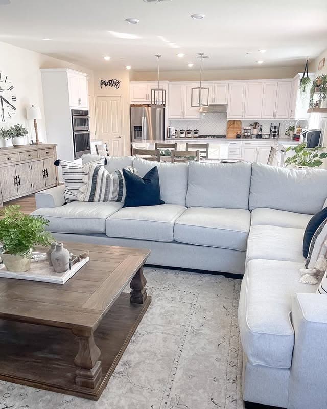 21. Open-Concept Comfort in Soft Neutrals - modern farmhouse living room ideas