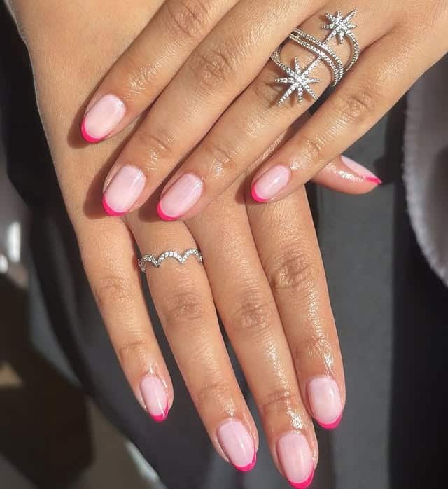 15. Bright Pink French Glow - pink french nail ideas