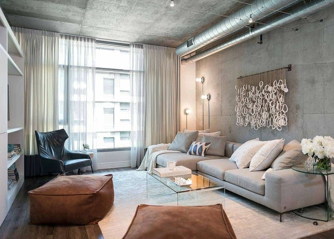 5. Concrete Elegance with Urban Softness - industrial living room ideas