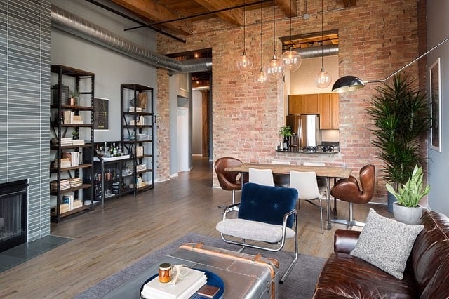 15. Brick and Steel Harmony Loft - industrial living room ideas
