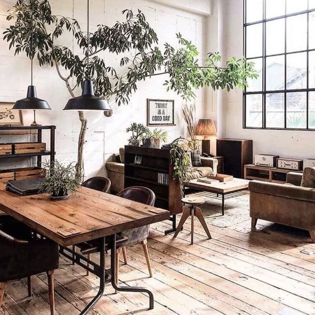 20. Organic Industrial Loft with Green Flourish - industrial living room ideas