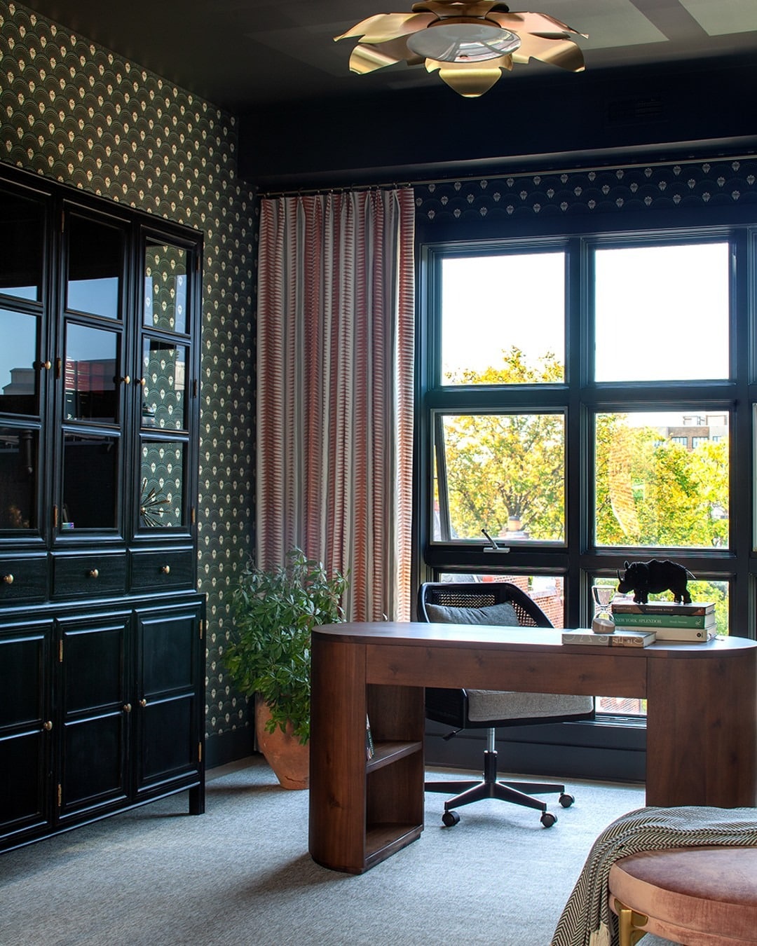 12. Sophisticated Depth in Midnight Green and Walnut - small therapy office decor ideas