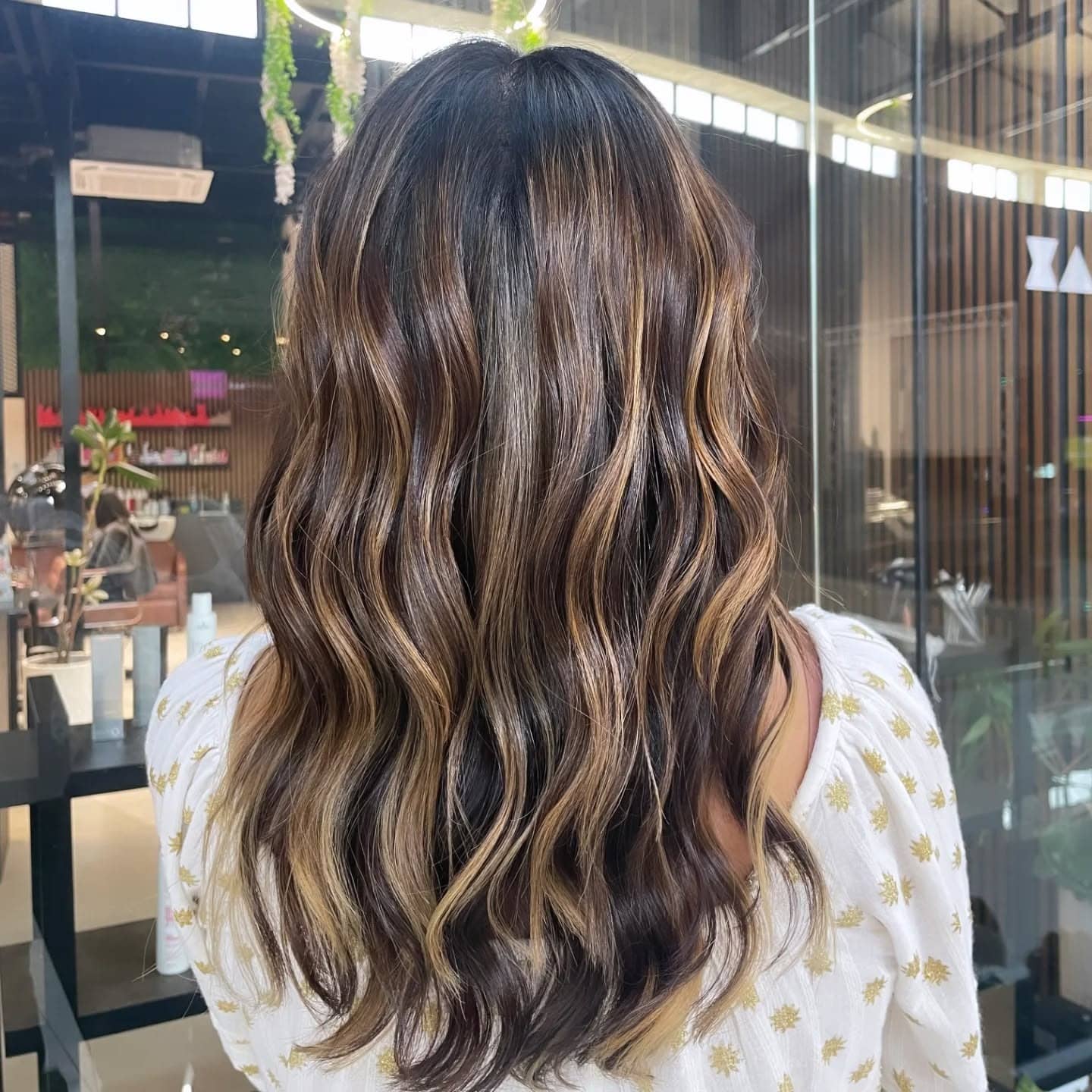 3. Warm Brunette with Caramel Ribbons - Honey Blonde Hair with Highlights