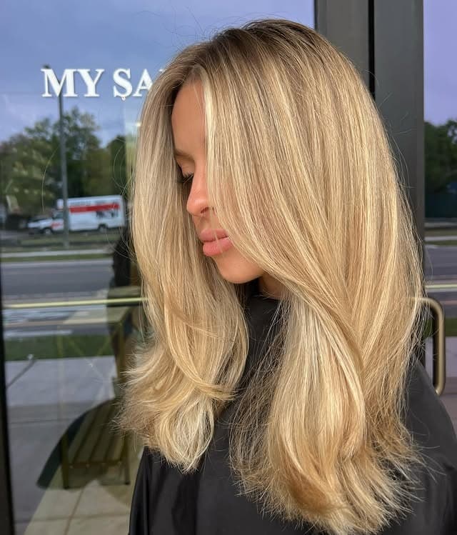 7. Golden Beige Layers with a Polished Finish - Honey Blonde Hair with Highlights