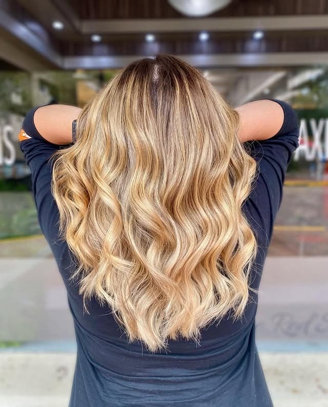 10. Golden Honey Waves with Subtle Dimension - Honey Blonde Hair with Highlights