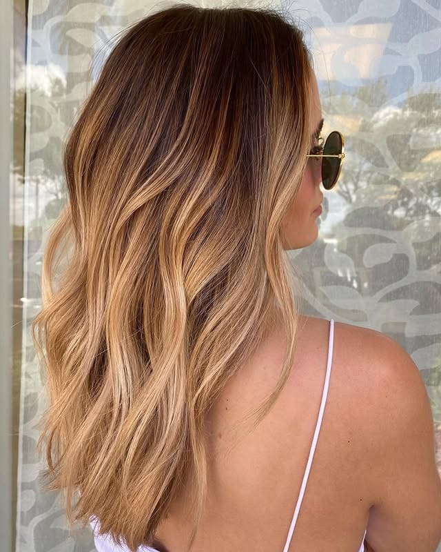11. Sunlit Honey Balayage with Soft Layers - Honey Blonde Hair with Highlights