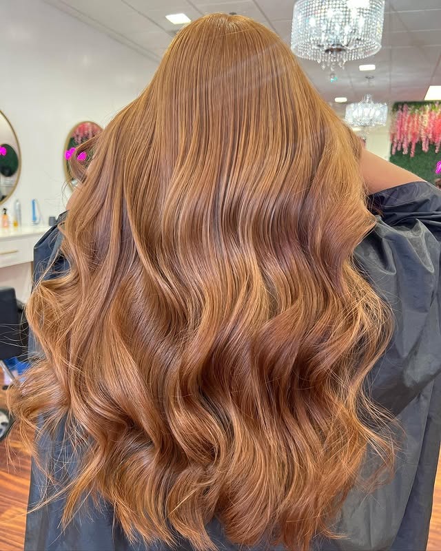 19. Copper-Toned Honey Waves - Honey Blonde Hair with Highlights