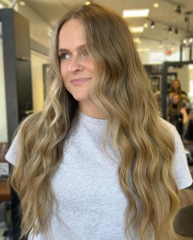 20. Cool-Toned Honey Balayage Waves - Honey Blonde Hair with Highlights