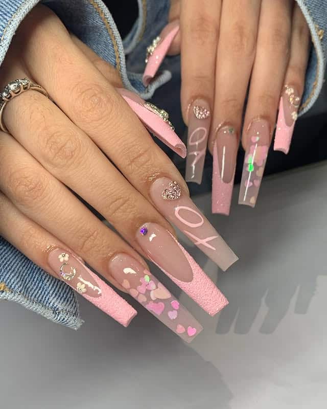 6. Baby Pink Long Nails with Mixed Textures and Heart Details - pink valentine nail ideas