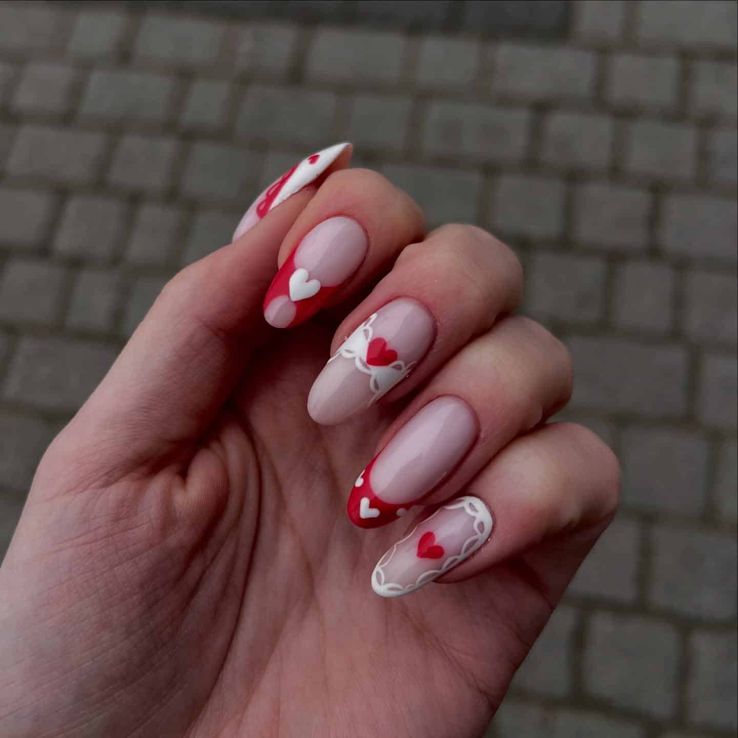 17. Red and White Valentine Heart Nails with Lace Detailing - pink valentine nail ideas