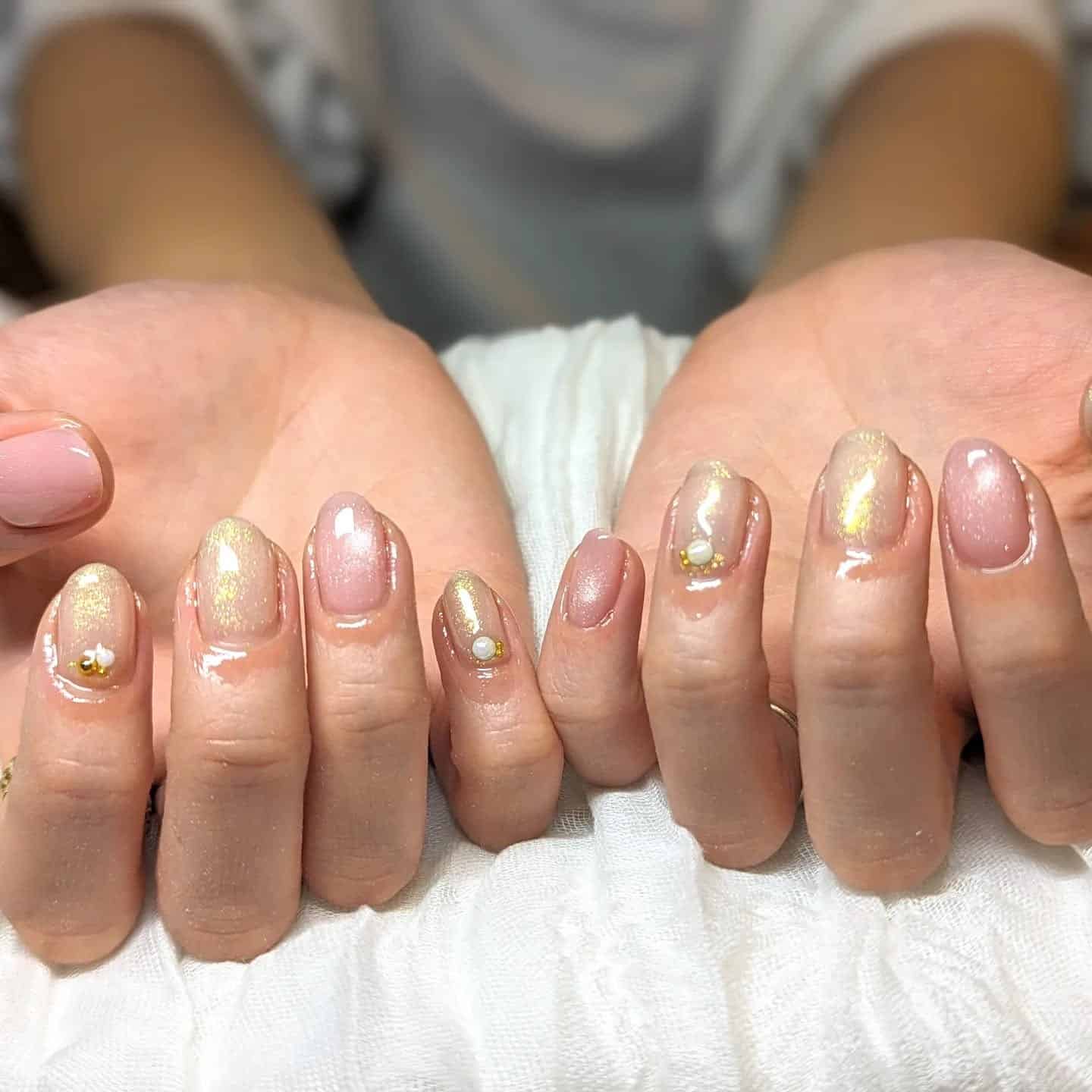 3. Golden Pearl Radiance - plum nail ideas