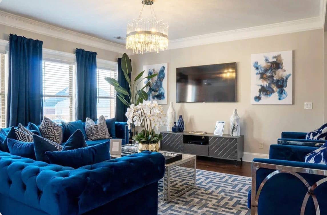 4. Bold Elegance in Sapphire Velvet - grey and blue living room ideas