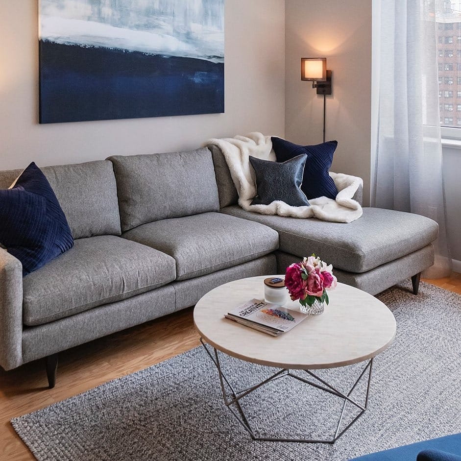 18. Understated Elegance in Grey and Indigo - grey and blue living room ideas