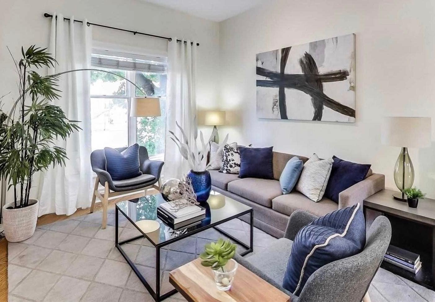 22. Modern Comfort with Ink Blue Accents - grey and blue living room ideas