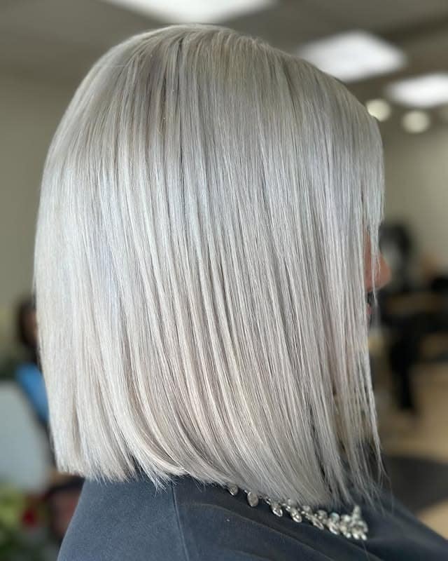9. Cool-Toned Platinum Mid-Length - Platinum Hair Color