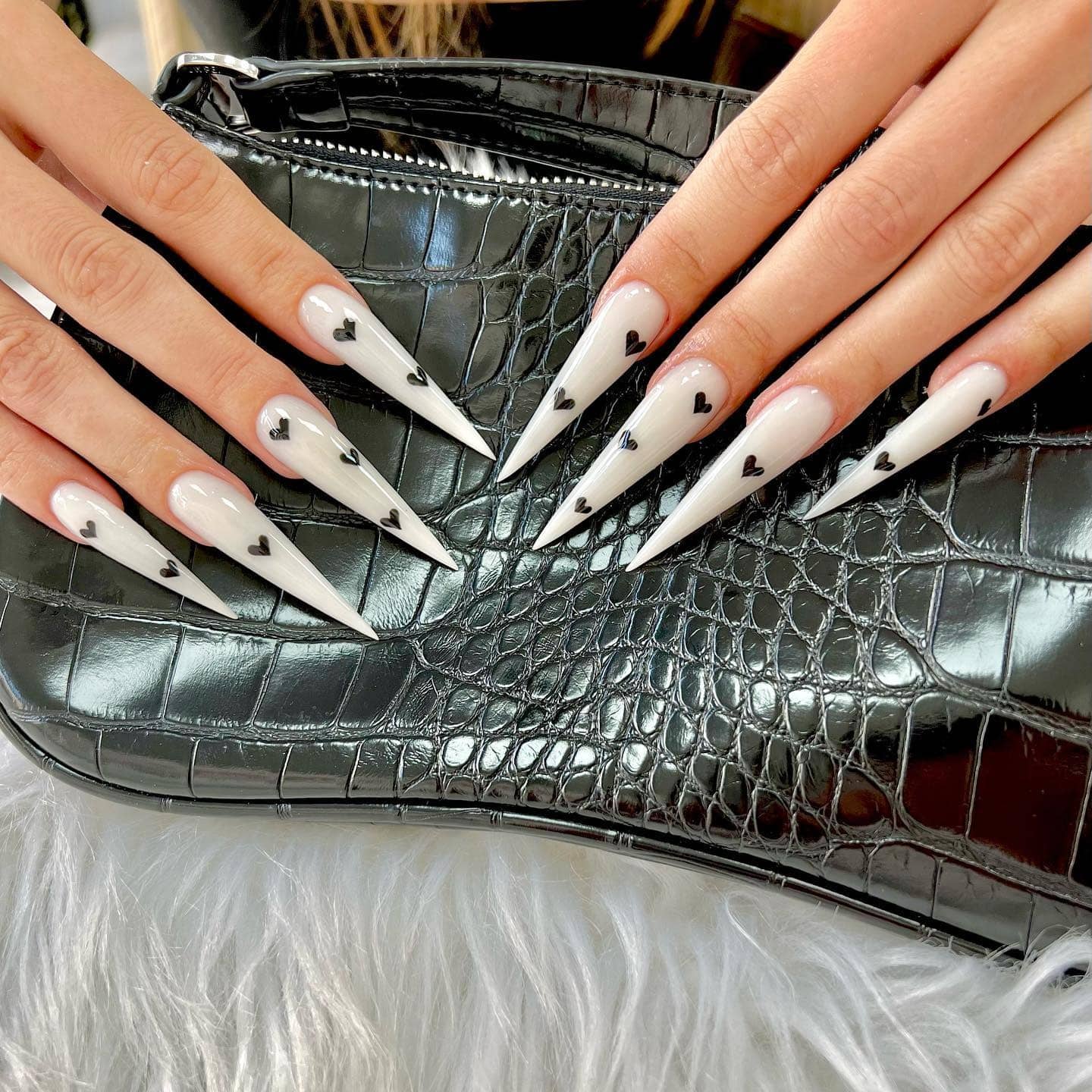 2. Monochrome Heart Tips - pointed nail ideas