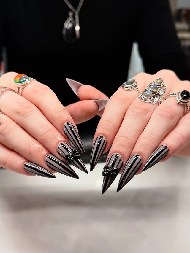 15. Striped Noir Nails - pointed nail ideas