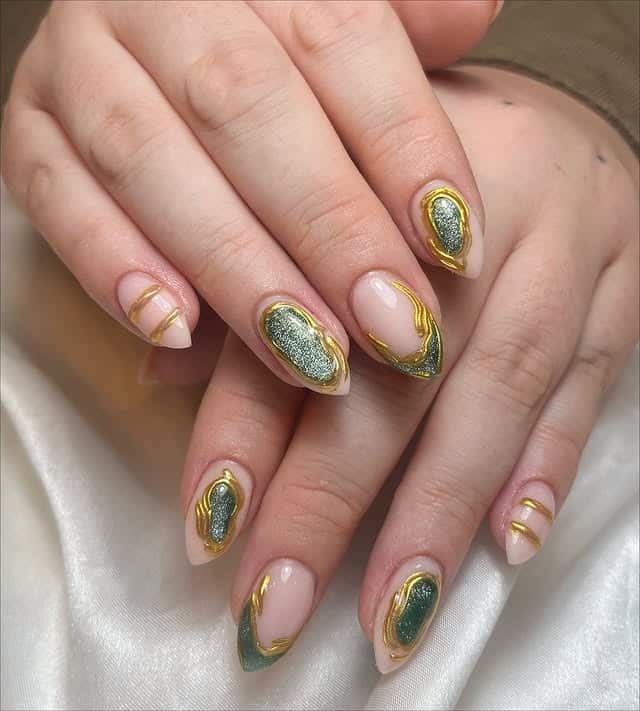 17. Emerald Gold Accent Nails - pointed nail ideas