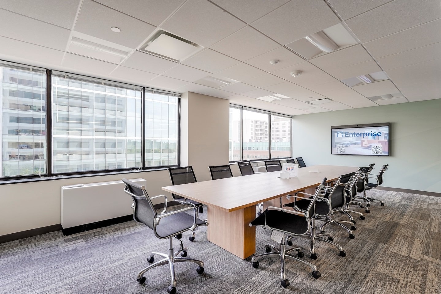 9. Conference Suite in Muted Wood and Steel - corporate office ideas