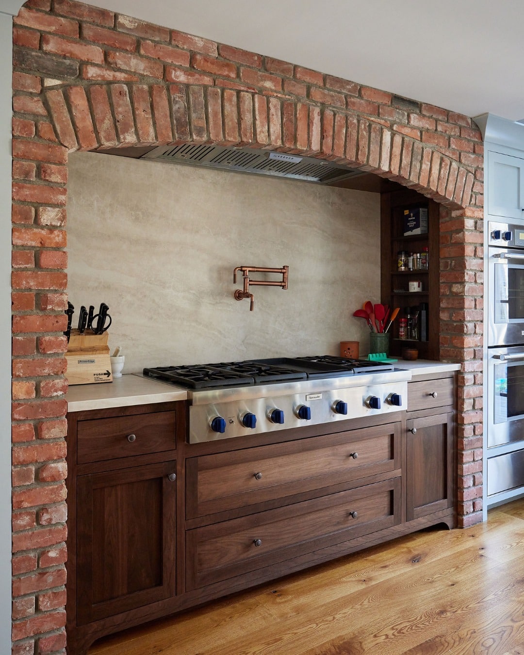 17. Brick Arch with Heritage Woodwork - kitchen centerpiece ideas