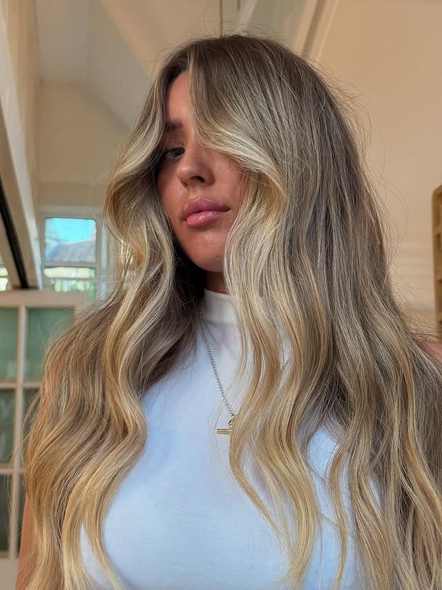10. Dimensional Butter Blonde Balayage - Long Blonde Hair