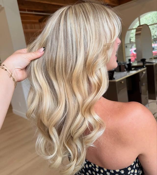 22. Golden Cream Balayage Waves - Long Blonde Hair