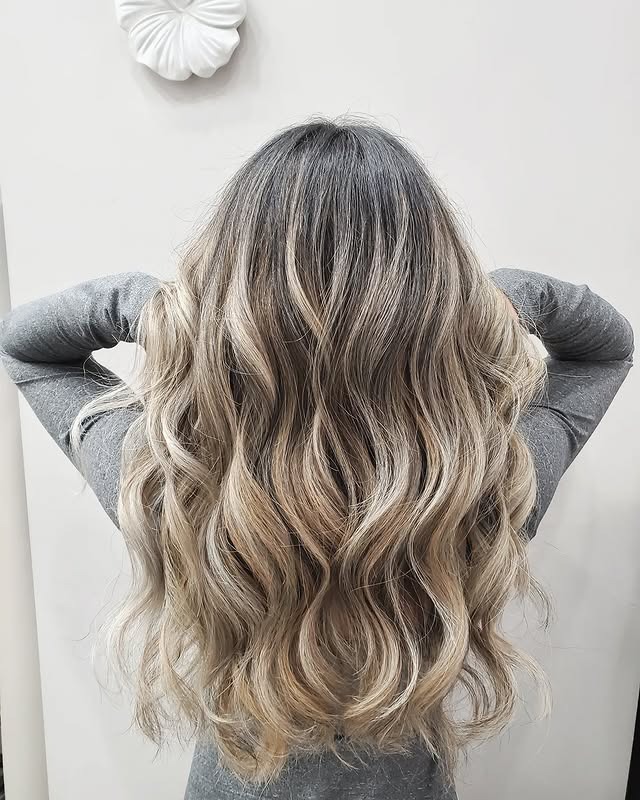 17. Sandy Ash Blonde Balayage with Voluminous Texture - Ash Blonde Balayage